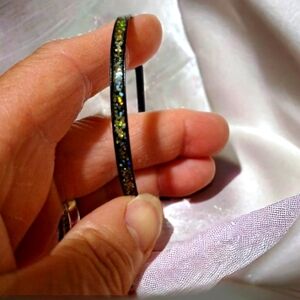 Multiple colored bangle bracelet.